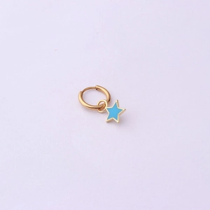 Detailed shot of golden hoop earring featuring a light blue enamel star pendant