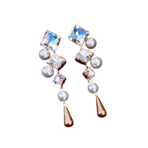 Elegant rose gold drop earrings with rainbow crystals, grey pearls and metal pendants