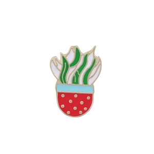 Cartoon enamel pin featuring a colorful potted plant with a polished golden metal frame
