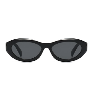 Classic black oval frame sunglasses with dark lenses in a vintage minimalist style