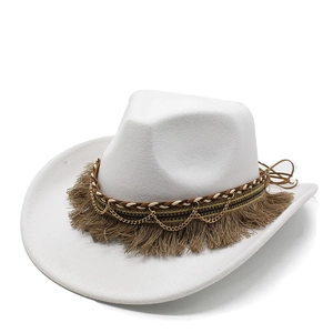 Detail of white felt fedora featuring brown fringe trim, metal chain, and woven band