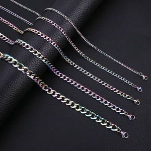 Close-up of rainbow plated stainless steel Cuban link chains in five different widths