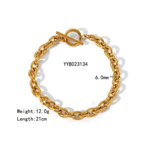Detail view of gold-plated stainless steel curb chain bracelet with toggle clasp design