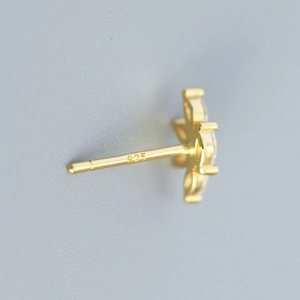 Elegant gold flower stud earrings in S925 silver with geometric zircon inlay detailing