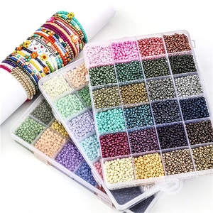 24-compartment storage box with 3mm glass seed beads and handmade colorful bracelets