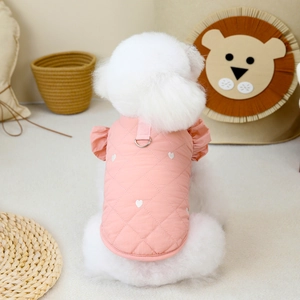 Pink quilted pet vest with ruffle sleeves and integrated metal D-ring for small dogs