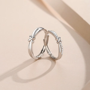 S925 sterling silver couple rings with adjustable open design in a polished silver finish