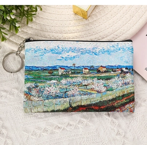 Close-up of canvas coin purse with Van Gogh style oil painting and metal keychain
