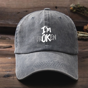 Vintage washed charcoal baseball cap featuring layered I'M BROKEN and OK letter print