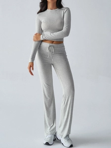 Detail showing soft cotton blend fabric on women's grey slim fit Y2K long sleeve top and pants