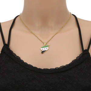 Detailed close-up of Syria map pendant in gold finish on black lace fabric