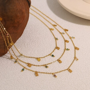 Bohemian gold chain necklace with colorful beads and geometric rectangular charms