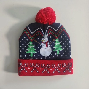 Navy blue Christmas LED knitted hat with festive snowman and tree patterns