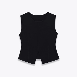 Black sleeveless knit top with center slit hem on a clean white background