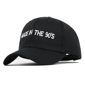 Classic black cotton baseball cap featuring white MADE IN THE 90'S embroidery at front
