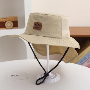 Detail showing the mesh vent and neck protective flap of the khaki sun bucket hat