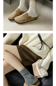 Detail of khaki suede clogs with cork soles and thick ribbed knit wool mid-calf socks