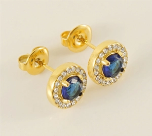 Detail of 18K gold-plated double-layer stud earrings with dark blue center stone and zircon