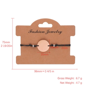 Minimalist wax cord braided bracelet featuring a rose gold circular stainless steel pendant