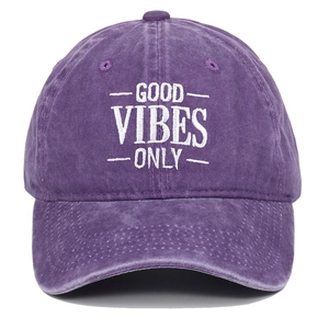Detail of Good Vibes Only embroidery on a vintage purple washed cotton baseball cap