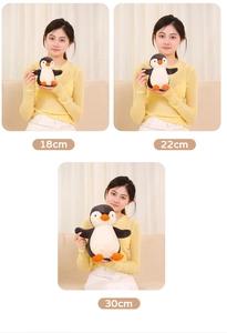 Plush penguin toy size comparison featuring 18cm, 22cm, and 30cm versions held by a model