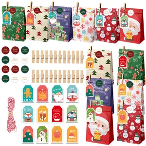Christmas gift bag set with colorful paper bags, stickers, wooden clips and festive rope