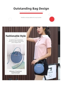 Detail view of a round blue leather shoulder bag with zipper and metallic logo