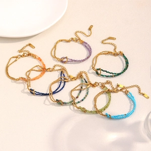 Detail of colorful beaded twist chain bracelets with 18K gold plated extension links