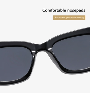 Close-up of comfortable integrated nose pads on black cat-eye sunglasses for pressure relief