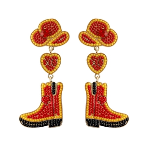 Detailed view of handmade beaded cowboy boot and hat earrings with red XO heart