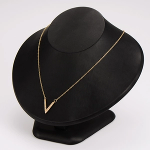 Elegant gold stainless steel V-shaped pendant necklace with pavé crystal accents