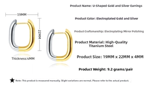 Detailed view of U-shaped steel earrings with 22x19mm dimensions and gold-silver finish