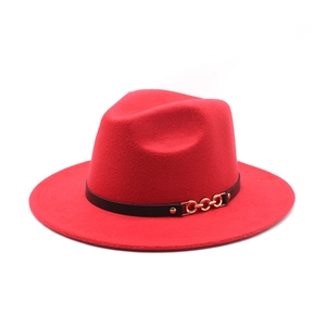 Red wool felt fedora with wide brim and decorative black band with gold chain buckle