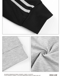 Detailed macro view of the knitted ribbed cuffs with grey stripes on heavy fleece fabric