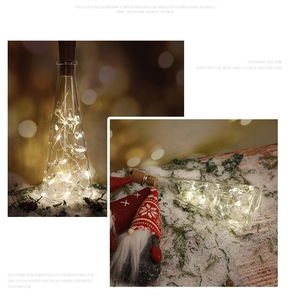 Detail of warm white LED cork bottle lights in a festive Christmas holiday scene