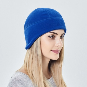 Close-up of royal blue fleece cycling cap showing ear protection and reinforced seams