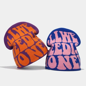 Y2K knit beanie with jacquard money lettering in vibrant contrasting color combinations