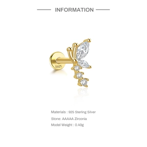 Macro detail of S925 sterling silver butterfly labret stud with white zirconia stones