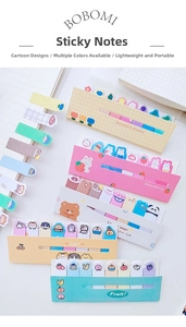 Macro view of cute cartoon index tabs featuring bear, cat and strawberry patterns