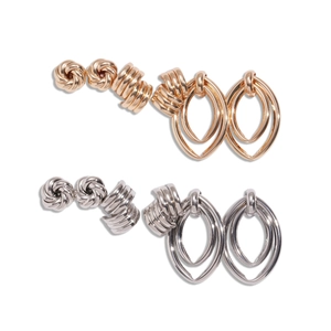 Eight-piece gold and silver metallic earring set with knot and oval floral designs