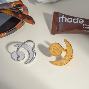 Fashionable sun and moon open rings in gold and silver finishes with hammered texture