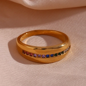 Detail of 18K gold-plated irregular curved ring set with colorful micro-inlaid gemstones