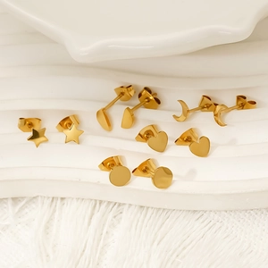 Golden titanium steel stud earring set featuring heart, star, and moon geometric shapes