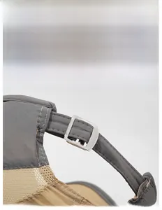 Detail of adjustable metal buckle and breathable mesh on outdoor color-block baseball cap
