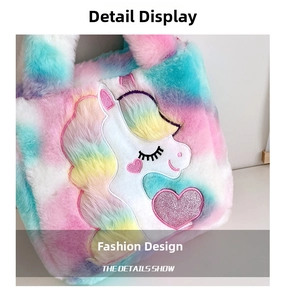 Detailed macro view of the fluffy rainbow plush fabric and unicorn embroidery on the bag