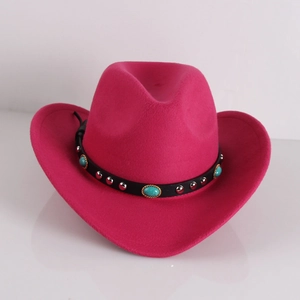 Detail of rose red cowboy hat featuring black leather belt with turquoise and silver studs