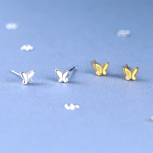 Minimalist s925 silver butterfly stud earrings in polished gold and silver finishes