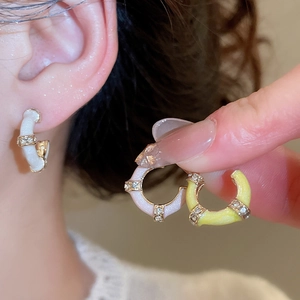 C-shaped bamboo earrings with rhinestones and enamel inlay in three colors