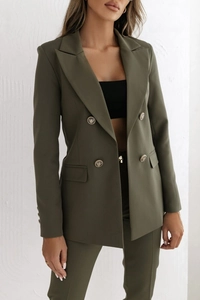 Detail of olive green double-breasted blazer with fine worsted fabric and sleek buttons