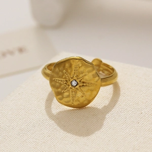 Vintage style gold stainless steel adjustable ring with starburst pattern and zircon inlay